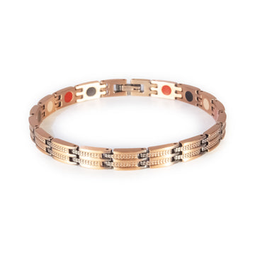 Canyon copper negative ion bracelet clasped front view, slim unisex design with etched bar pattern.